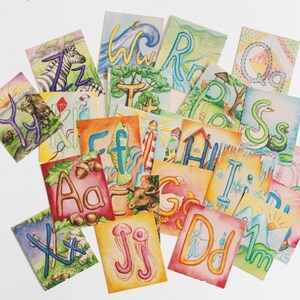 May include: A set of colorful alphabet cards featuring hand-painted illustrations of animals, nature scenes, and objects. Each card has a letter of the alphabet and a corresponding image. The cards are perfect for teaching children the alphabet and building vocabulary.