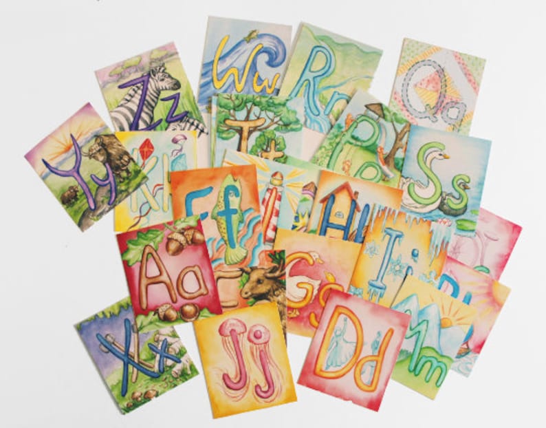 May include: A set of colorful alphabet cards featuring hand-painted illustrations of animals, nature scenes, and objects. Each card has a letter of the alphabet and a corresponding image. The cards are perfect for teaching children the alphabet and building vocabulary.