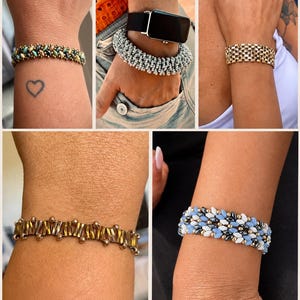 May include: A collection of five distinct beaded bracelets. One features multi-colored seed beads, another has silver metallic beads, a third is a gold-toned woven link bracelet, the fourth uses amber-colored glass tubes, and the fifth has blue and white beads.