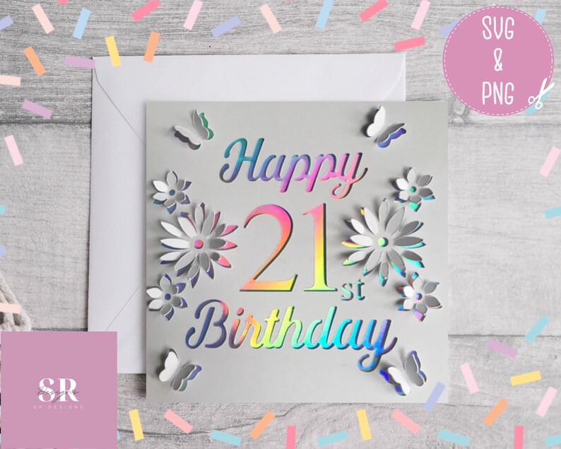 May include: A gray card with a holographic finish features the text "Happy 21st Birthday" with a large number 21. The card is decorated with flowers and butterflies.