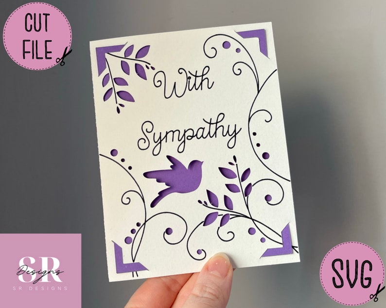 May include: A white card with a purple bird and floral design. The card says "With Sympathy".