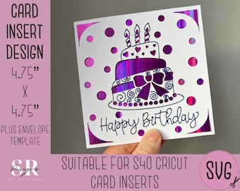 May include: A purple and white birthday cake card insert design with the text "Happy Birthday" and a bow on top of the cake. The design is 4.75 inches by 4.75 inches and is suitable for a Cricut S40.