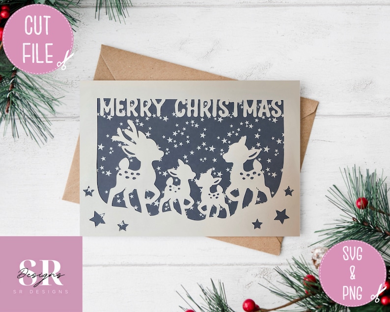 May include: A white card with a gray background and the text "Merry Christmas" in white. The card features a silhouette of four deer with stars in the background.