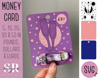 May include: Purple card with a pink and white polka dot design. The card has a drawing of two champagne glasses and the text "£20". A rolled up bill of money is partially visible on the card.