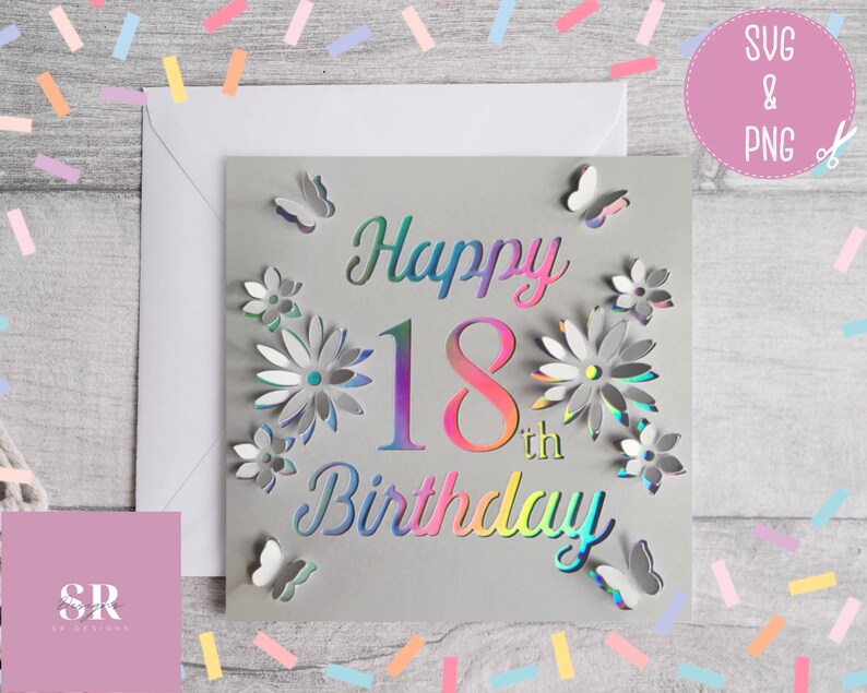 May include: A gray card with a holographic design that says "Happy 18th Birthday" with flowers and butterflies around the text.