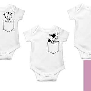 May include: Three white baby onesies with different animal designs in the pocket. The animals are a tiger, a cat, and a raccoon.