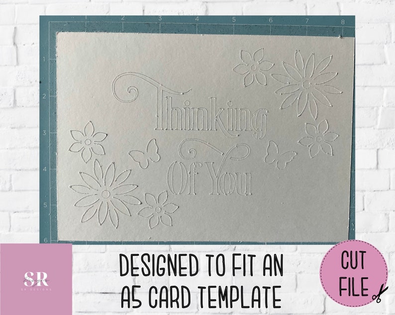 May include: A white card with the text "Thinking of You" in a decorative font. The card is decorated with a floral design and butterflies. The card is designed to fit an A5 card template.