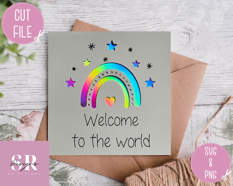 May include: A gray card with a rainbow and stars cut out. The card says "Welcome to the world".