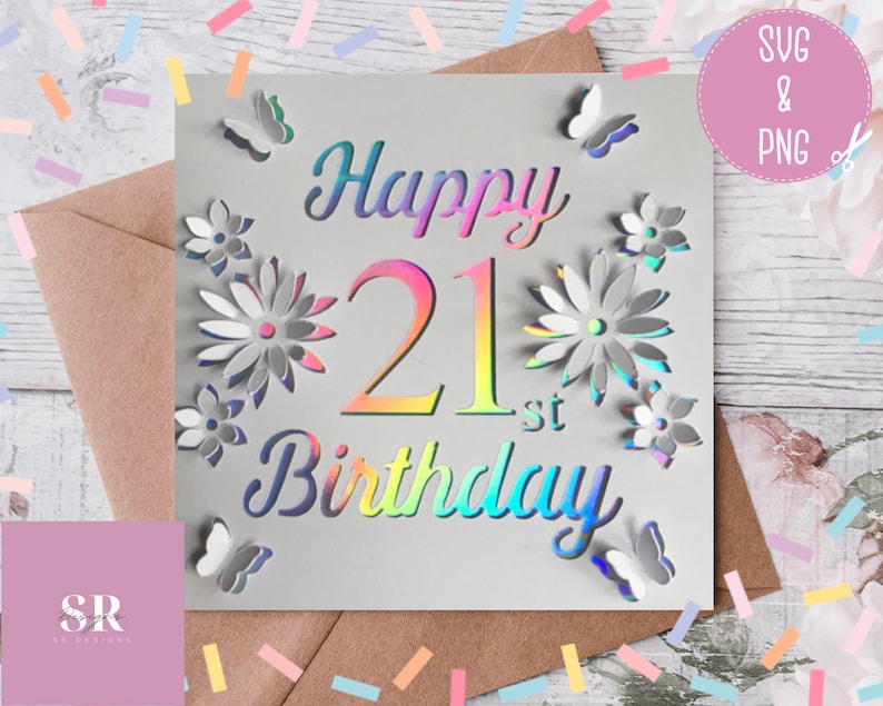 May include: A white card with a holographic finish featuring the text "Happy 21st Birthday" surrounded by flowers and butterflies.