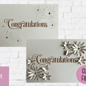 May include: Two white cards with the word "Congratulations" cut out in a brown font. The cards are decorated with white paper flowers and butterflies. The text "CUT FILE" is in a pink circle on the bottom right corner of the image.