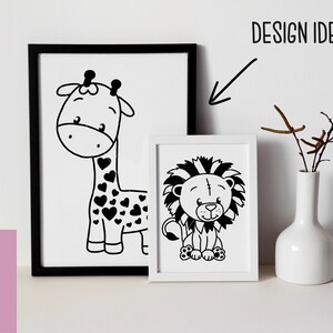 May include: Two black and white illustrations of animals in white frames. The left frame shows a giraffe with a heart pattern. The right frame shows a lion with a mane. The frames are on a white surface with a white vase and brown branches.