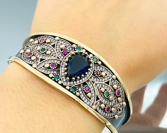 Bracciale rigido da donna in argento sterling con zaffiro blu: design a forma di aquila fatto a mano
