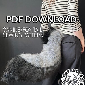 May include: PDF download for a canine/fox tail sewing pattern. The image shows a person wearing a black and white striped shirt and black pants with a gray and black furry tail attached to the back of their pants. The tail is long and bushy. The image also includes a logo for "Octavia's Creatures".
