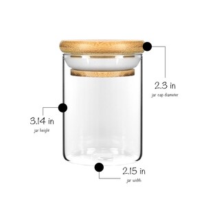 May include: A clear glass jar with a bamboo lid. The jar is 3.14 inches tall, 2.15 inches wide, and the lid is 2.3 inches in diameter.