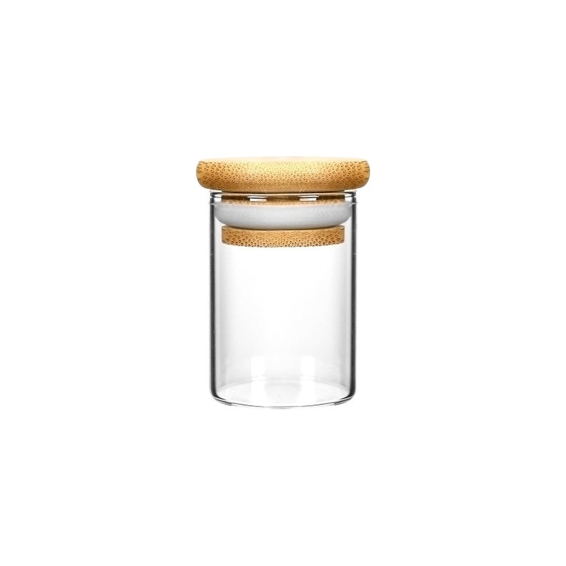 May include: A clear glass jar with a bamboo lid. The lid has a white rubber seal.