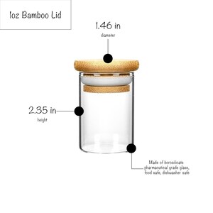 May include: A clear glass jar with a bamboo lid. The jar is 2.35 inches tall and 1.46 inches in diameter. The jar is made of borosilicate glass, is food safe, and is dishwasher safe.