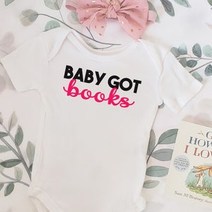Pink Baby Got Books Bookish Baby Bodysuit for Book Club Baby Shower Reader Writer Author Surprise Baby Birth Announcement Funny