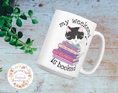 My Weekend is Booked Cute Cat Mug Funny Books and Cat Pun Bookstagram Gift for Readers Bookworms, Librarian Gift Watercolor Cute Coffee Cup