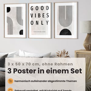 May include: Set of three framed posters. The central poster reads "GOOD VIBES ONLY" in bold black letters. The other two posters feature abstract black and white geometric designs. Each poster is 50 cm x 70 cm.