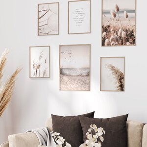 May include: A set of six framed prints with a beach theme. The prints feature images of seashells, grasses, and a beach scene with birds flying over the ocean. The prints are all in a neutral color palette of beige, brown, and white.