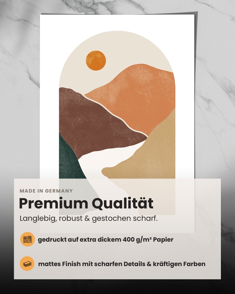 May include: Abstract art print featuring a landscape with mountains, a river, and a sun in a peachy orange color. The print has a matte finish and is printed on thick paper.