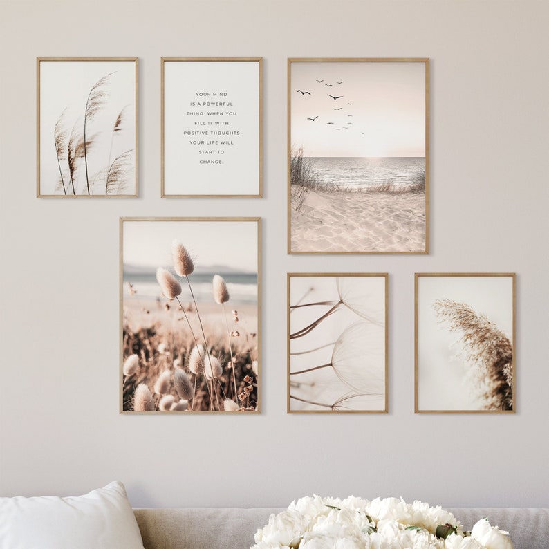 May include: A set of six minimalist wall art prints featuring nature-inspired imagery. The prints include a quote about positive thinking, a beach scene, and various close-ups of grasses and flowers.