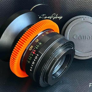 アナモルフィックレンズHelios-44 M 2/58 mmシネモッド、Canon EFアダプター付き、楕円ボケ効果とアンバートーンを備えたビンテージレンズ