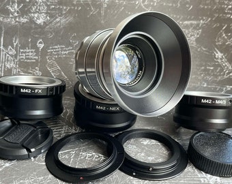 Helios 44-2 58mm f/2.0 Cine mod lens, with any adapter of your choice Sony E (NEX), Canon EF, FujiFilm FX, Nikon, Micro 4/3, Silver lens