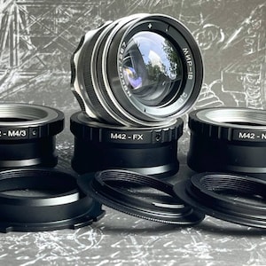 Mir-1B 37mm f/2.8 Wide-angle lens with any adapter of your choice Sony E (Nex), Canon EF, Fujifilm FX, Nikon, Micro 4/3, PL, silver lens
