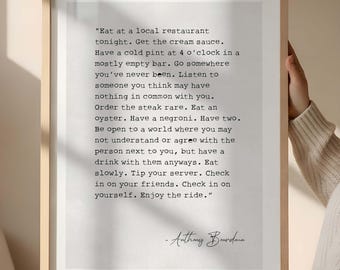 Anthony Bourdain Eat at a local restaurant quote, Framed Poster