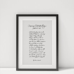 May include: A framed print featuring handwritten script. The text, titled "Composed upon Westminster Bridge," is in black ink on a white background. The frame is black. The poem is signed by William Wordsworth.