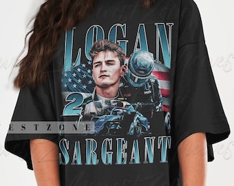 May include: Black oversized t-shirt with a graphic print of a race car driver with the text "Logan Sargent" and a large American flag in the background.