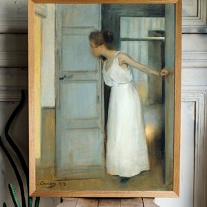 May include: A framed painting of a woman in a white dress standing in a doorway. The woman is looking to the left and her hand is on the door handle. The painting is signed "Caras 33" in the lower right corner.