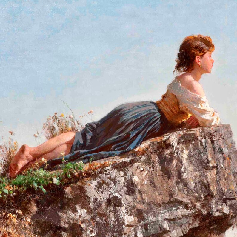 May include: A woman in a blue and gold dress lies on a rocky outcrop, looking out at the horizon. The sky is a pale blue, and the woman's hair is a reddish brown.