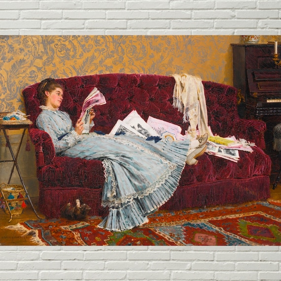 A Little Girl, Lying on a Sofa, Captivated by the Laptop Screen in A Little Girl, Lying on a Sofa, Captivated by the Laptop Screen in