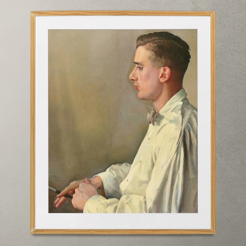 May include: A framed portrait of a man in a white shirt with a bow tie. The man is looking to the side and has short brown hair. The background is a light brown color.