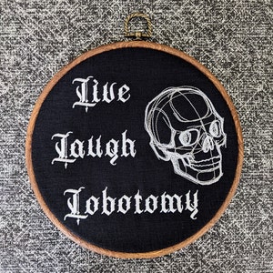 Live Laugh Lobotomy. Machine embroidery 8" hoop. Sassy, feminist, vintage embroidery art with modern gothic inspiration. Horror movie fan