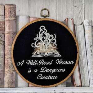 A well-read woman is a dangerous creature. Machine embroidery 8" hoop, sassy embroidery, empowerment, feminist,  Lisa Kleypas