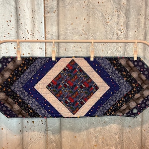 Blue winter themed quilted table runner