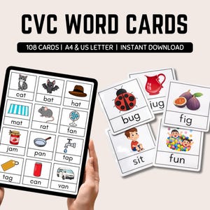May include: Educational CVC word cards with illustrations and text. The image shows a tablet displaying word cards and a set of loose cards. The words include "cat", "bat", "hat", "bug", "mat", "rat", "fan", "jug", "fig", "jam", "pan", "tap", "sit", "fun", "tag", "can", and "van".