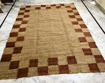 Handwoven Jute Area Rug: Natural Brown with Red Checker Border