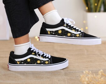 Vans with cheap yellow flowers