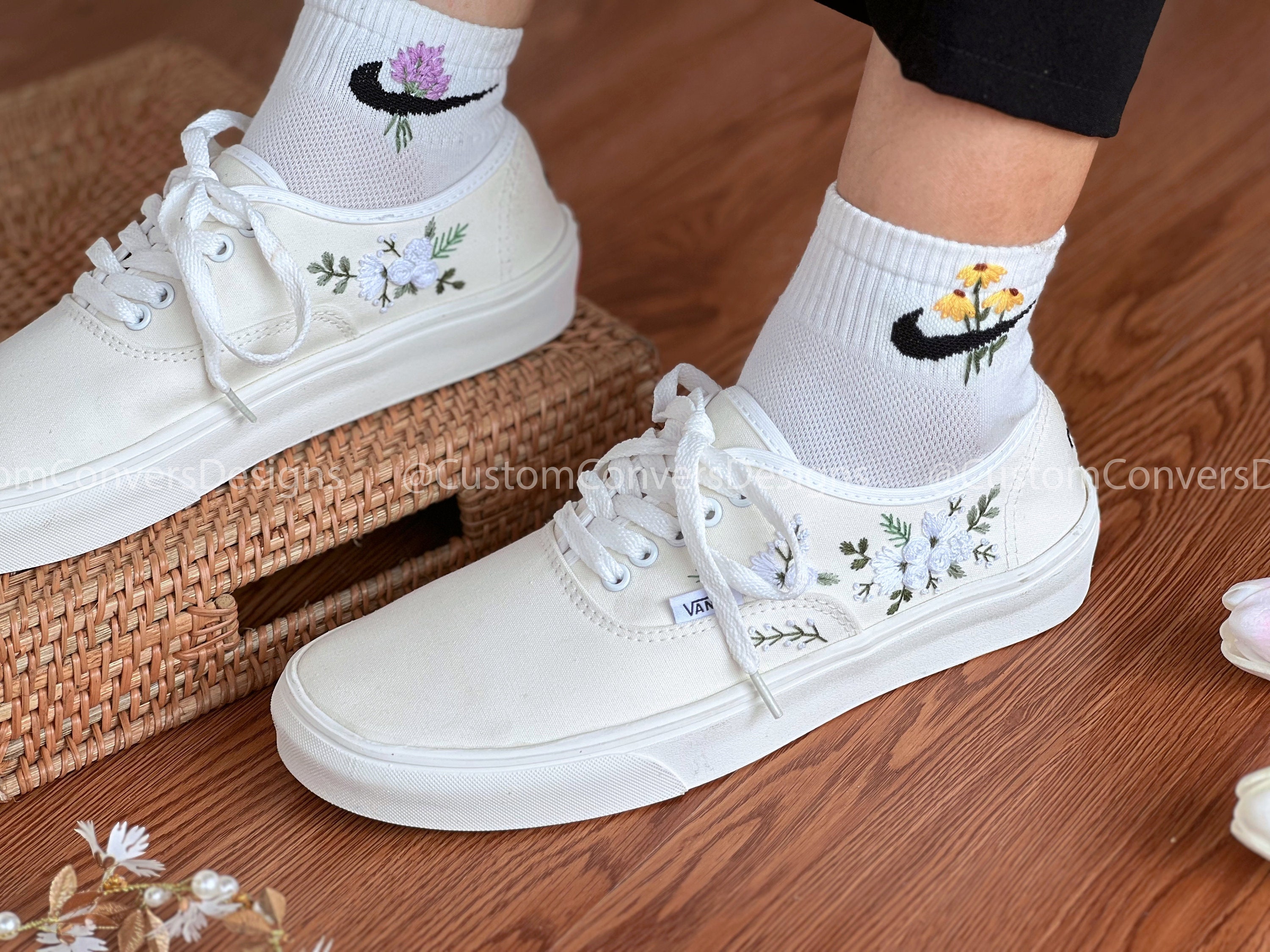 Vans with top flowers on them