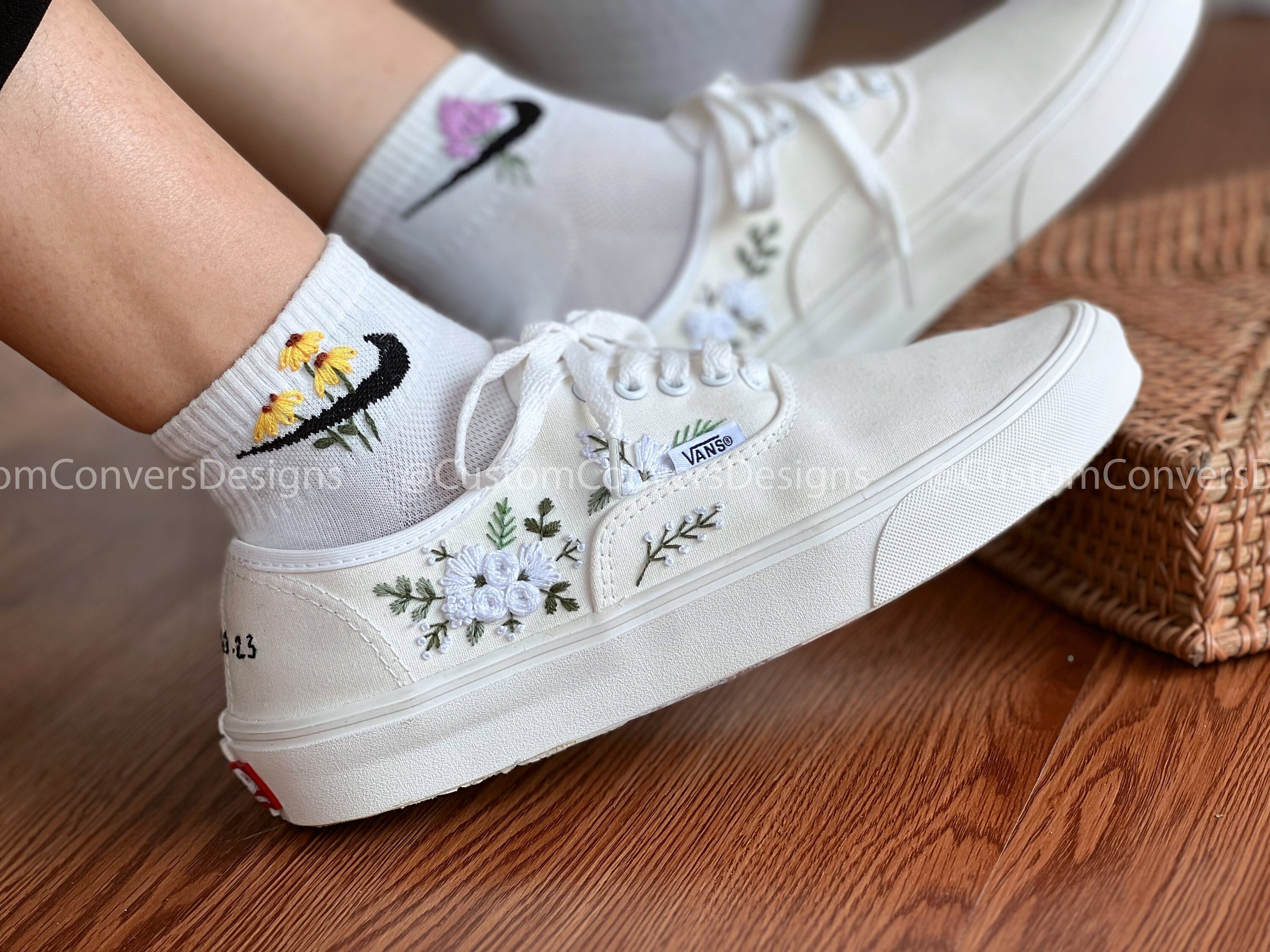 Vans with flowers on them top