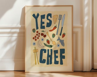 May include: A beige poster with the text "YES CHEF" in blue letters. The poster is decorated with various food items, including a fish, a chili pepper, a spoon, a fork, a knife, a piece of cheese, a green pepper, a dumpling, chopsticks, and cherries.