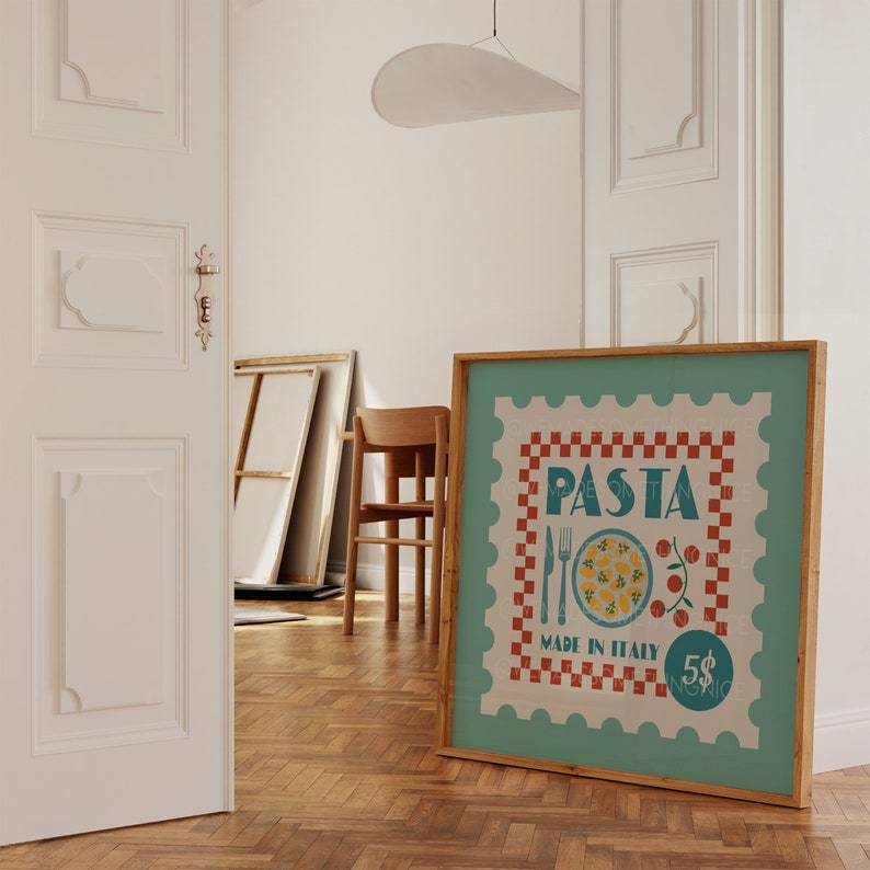 May include: A framed poster with a teal border and a beige background. The poster features the word "PASTA" in teal, a plate of pasta, and the text "MADE IN ITALY". A red and white checkered pattern surrounds the central image.
