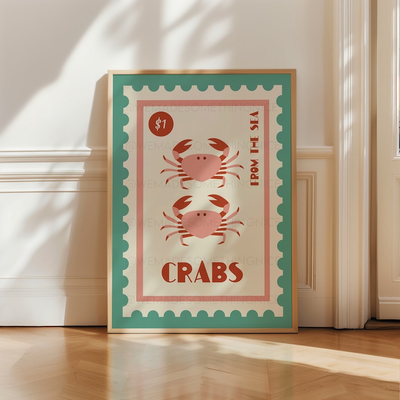 May include: A vintage-style poster with a teal border and a cream background featuring two red crabs with pink bodies. The poster has the text "$1" and "FROM THE SEA" in red and "CRABS" in pink.