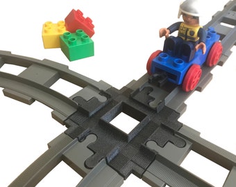 Children's playground, 4-way crossing for Duplo train