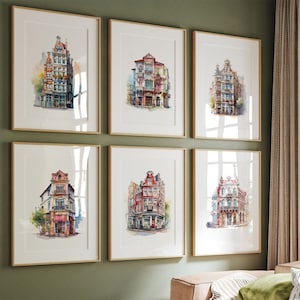 Könnte beinhalten: Sechs gerahmte Aquarelldrucke von europäischen Gebäuden. Jeder Druck zeigt ein anderes Gebäude mit detaillierten architektonischen Elementen und leuchtenden Farben. Die Gebäude sind vor einem weißen Hintergrund in hellem Holz gerahmt.