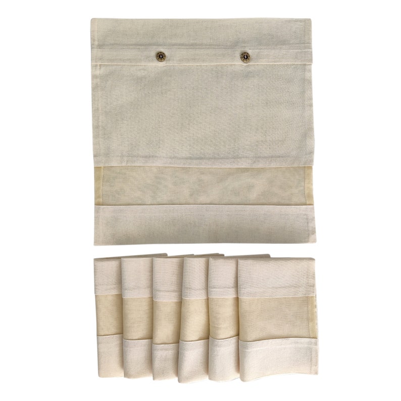 May include: A set of beige roman shades with a sheer panel. The shades are made of a woven fabric and have a simple design. The shades are shown in both a rolled up and unrolled position.